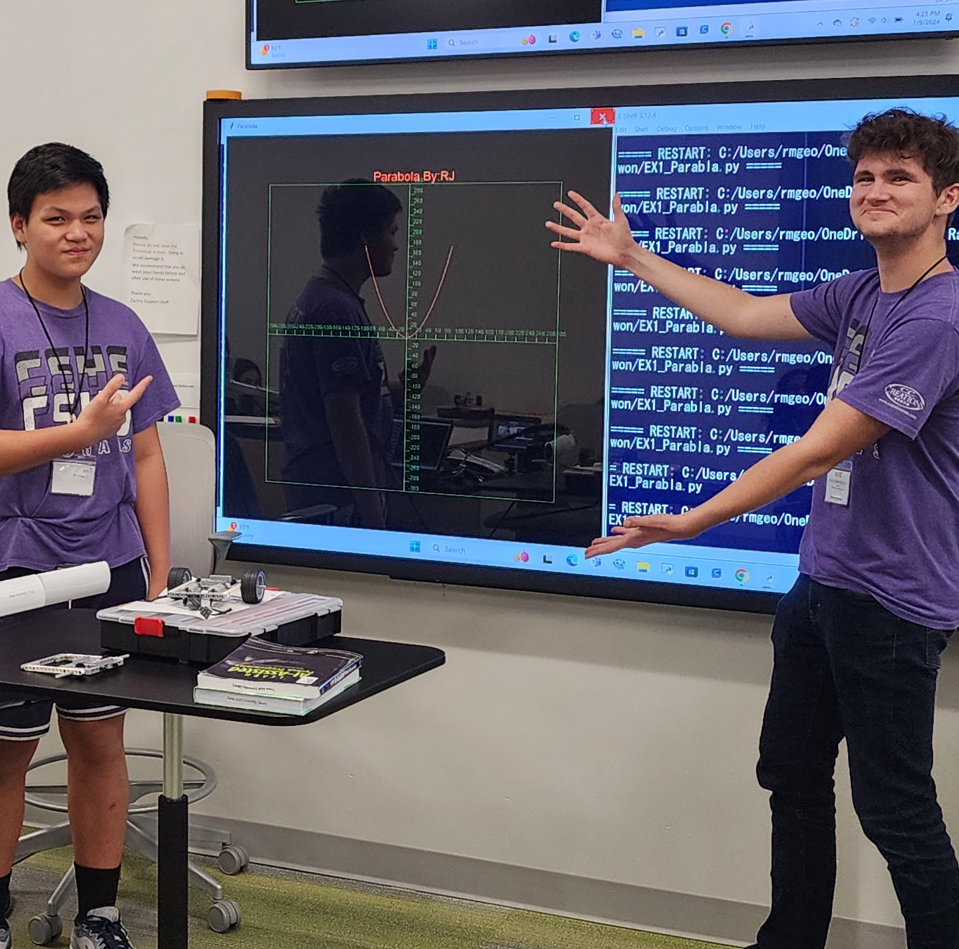 Students presenting STEM work in class